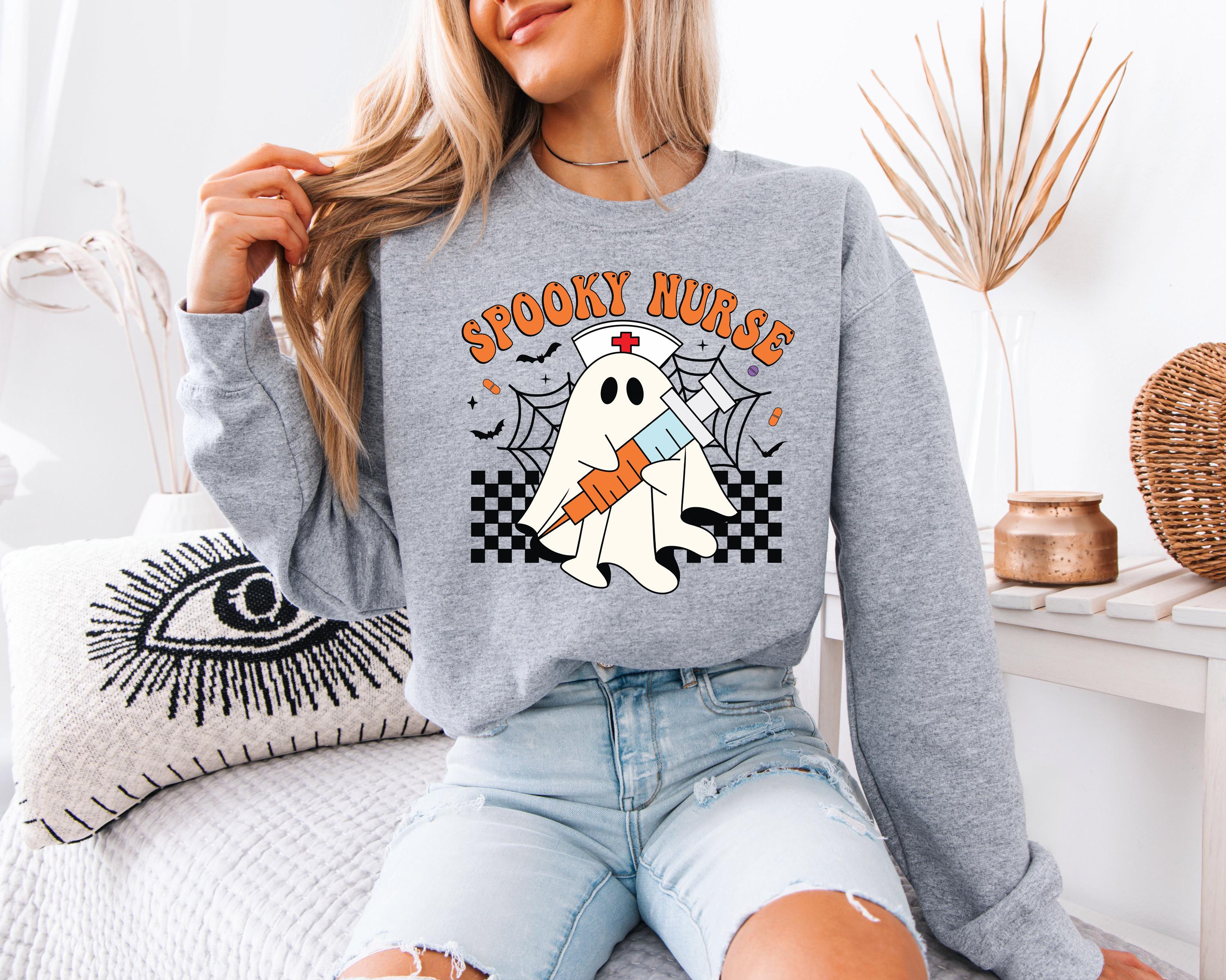 Spooky Nurse retro Halloween Sweatshirt, Halloween Gift for Nurse Sweater, Nurse Spooky , Nurse Halloween Boo Boo Crew