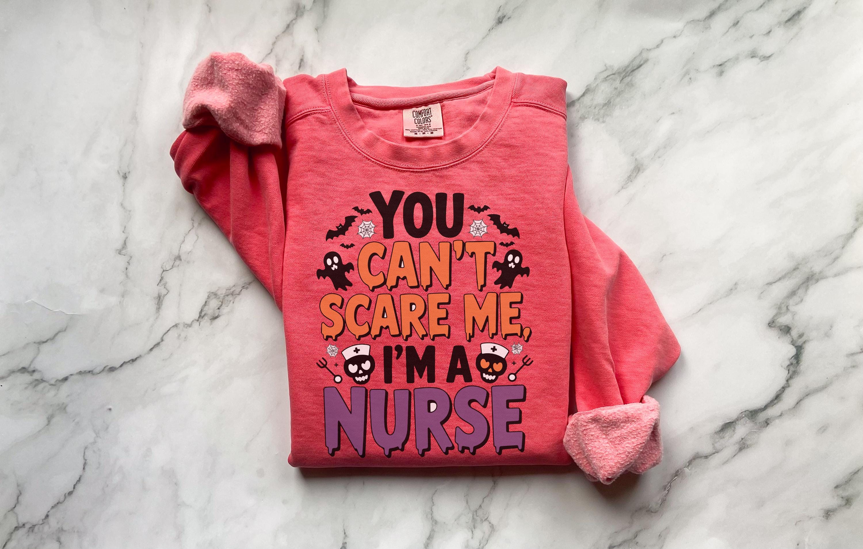 Funny Halloween Nurse Sweatshirt: Spooky RN Top, Ghosts & Bats