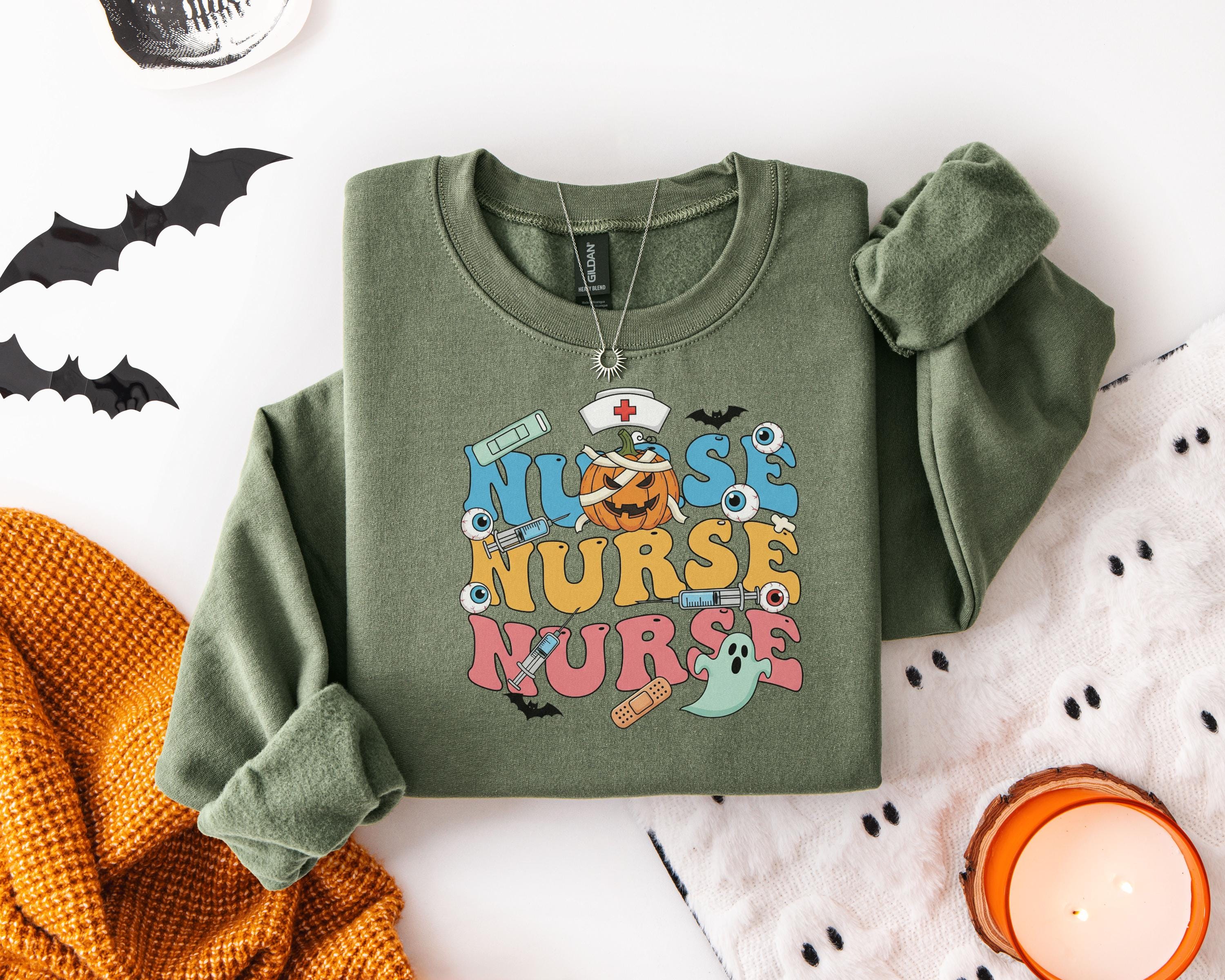 Vintage Nurse Halloween Colorful Sweatshirt, Cute Medical Fall Shirt with Ghosts, Pumpkin, and Eyeballs, Spooky Gift for Healthcare Nurse