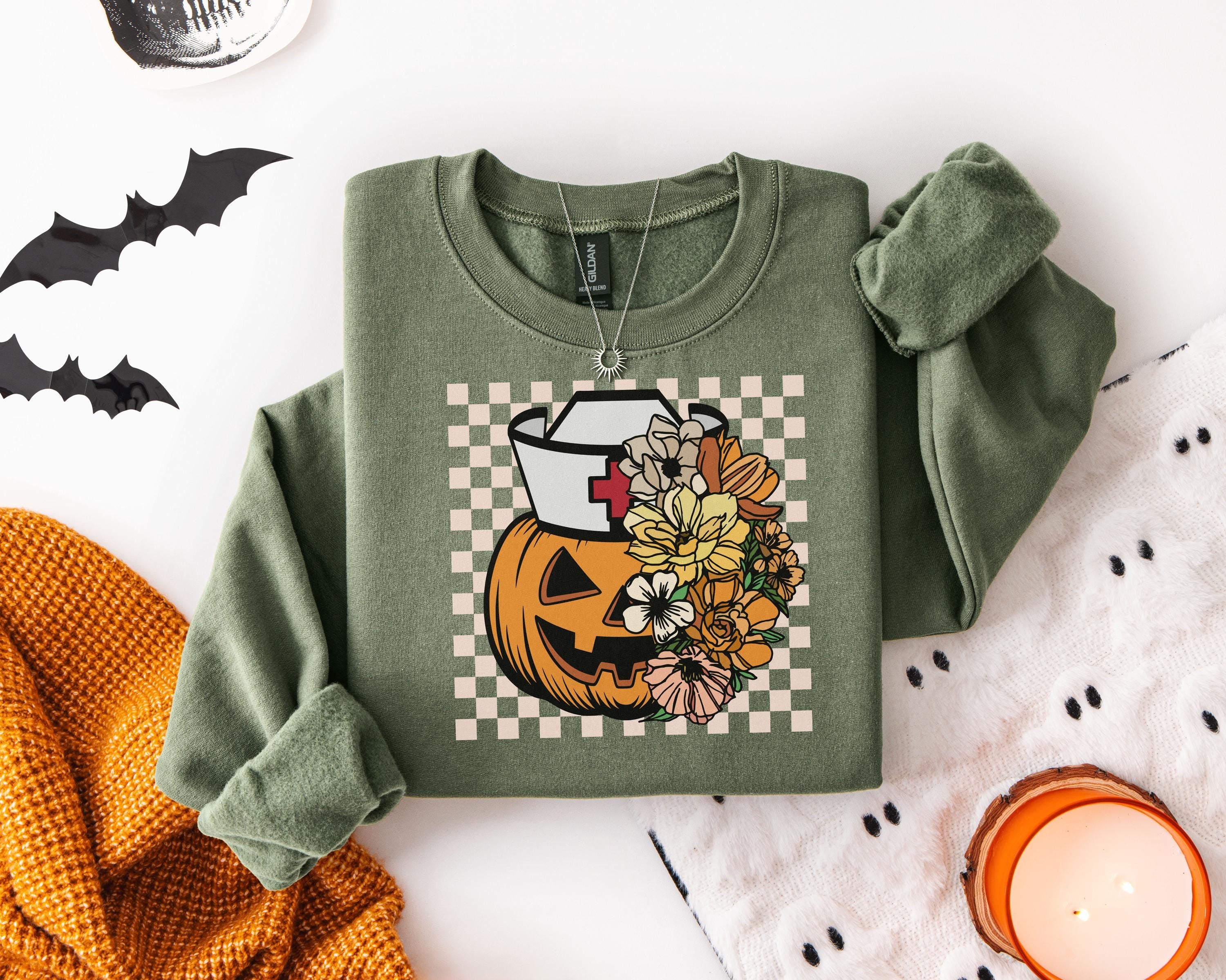 Halloween Nurse Shirt, Cute Pumpkin Ghost RN Tee, Spooky Fall Nurse Top, Funny Medical Halloween Outfit, Gift for Nurse, RN Apparel