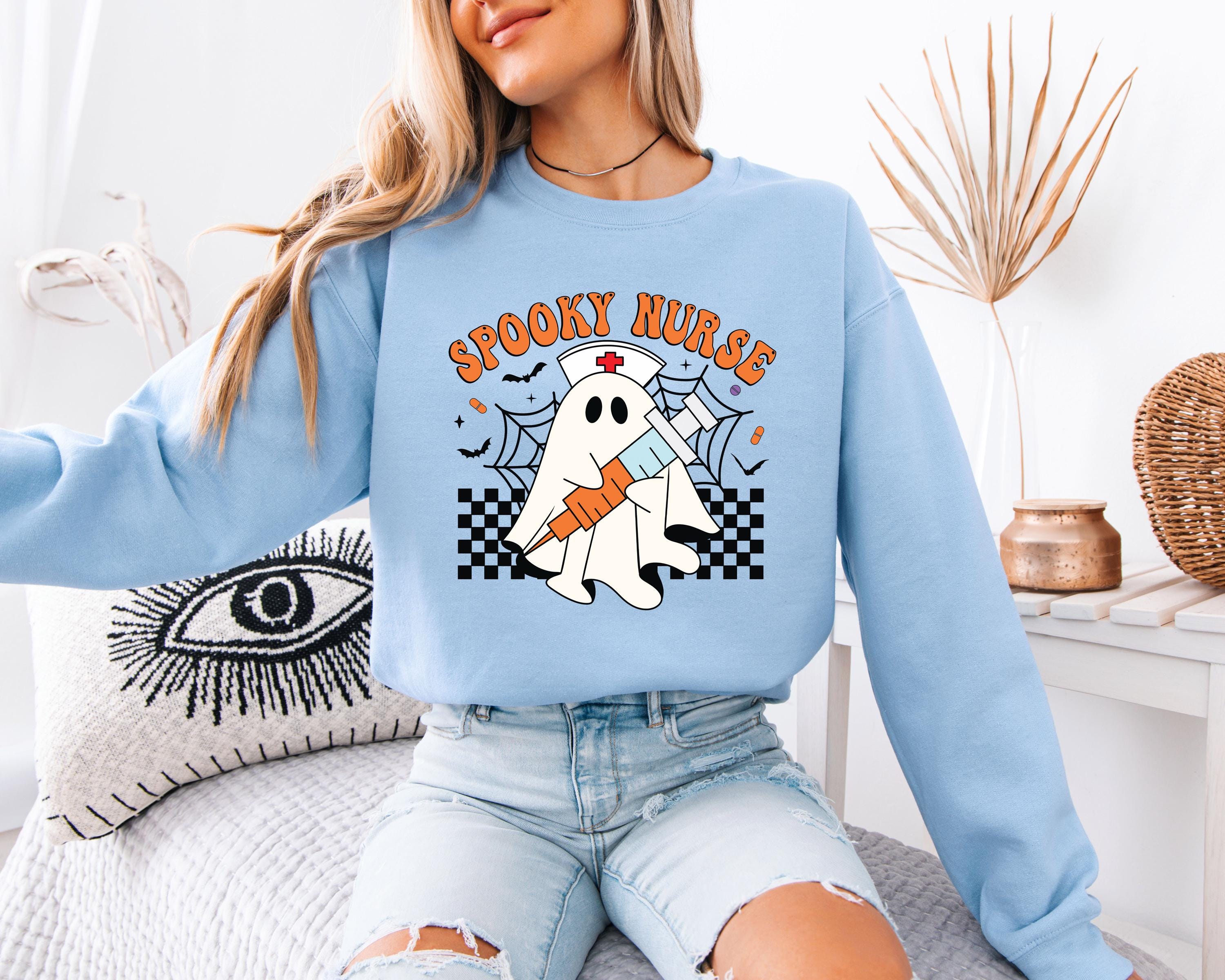 Spooky Nurse retro Halloween Sweatshirt, Halloween Gift for Nurse Sweater, Nurse Spooky , Nurse Halloween Boo Boo Crew