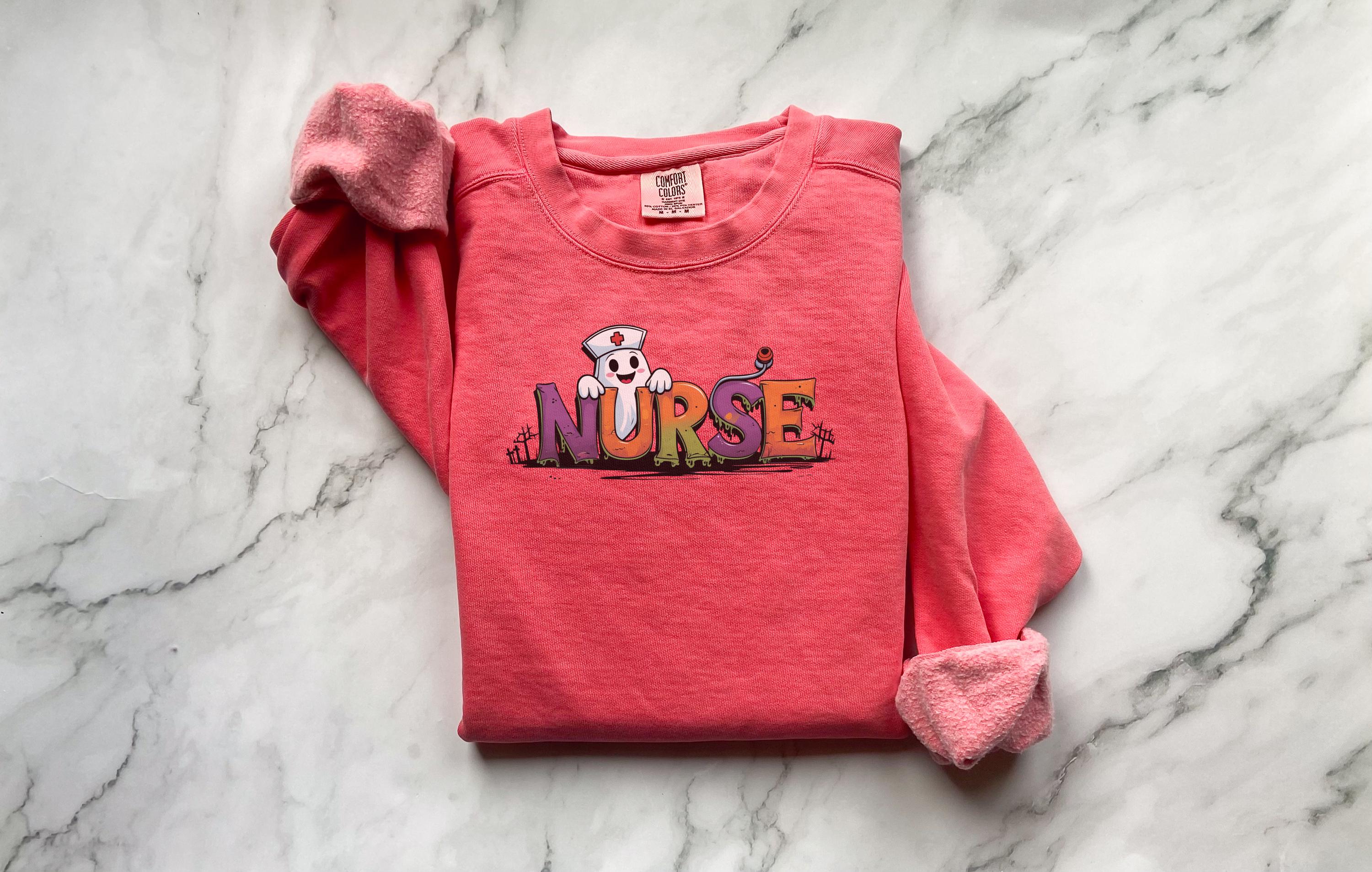 Cute Halloween Nurse Sweatshirt, Cartoon Ghost RN Letters Shirt, Fall Nursing Pullover, Spooky Nurse Halloween Shirt Gift for Nurse RN