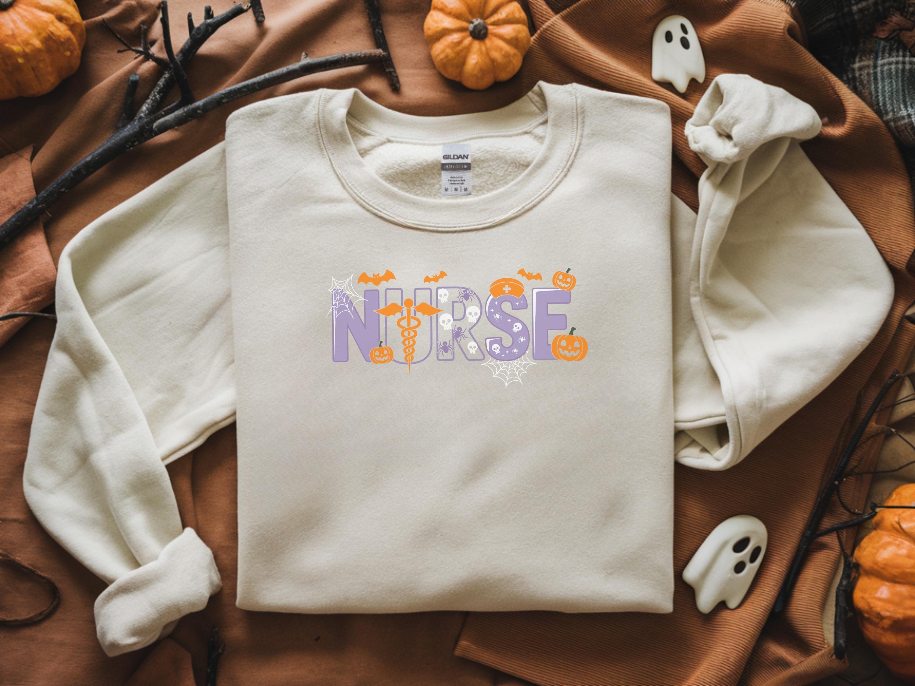 Halloween Nurse Shirt, Spooky Cute Nurse T-Shirt with Ghosts and Pumpkins, Fall Nursing Tee, Gift for Nurse, RN Halloween Top