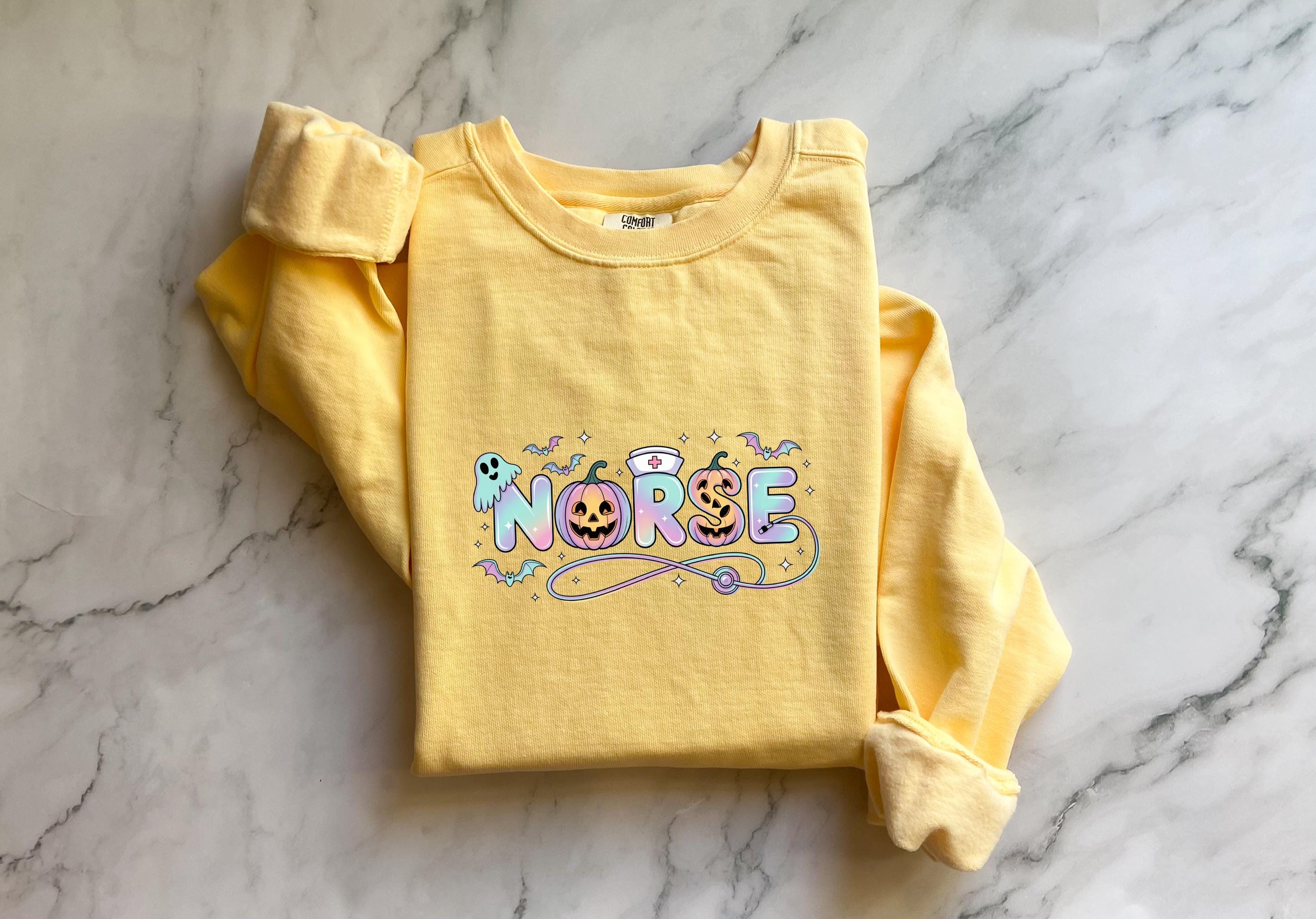 Halloween Nurse Comfort Colors Sweatshirt, Cute RN Crewneck Pullover, Spooky Ghost Pumpkin Candy Letters, Fall Nurse Gift