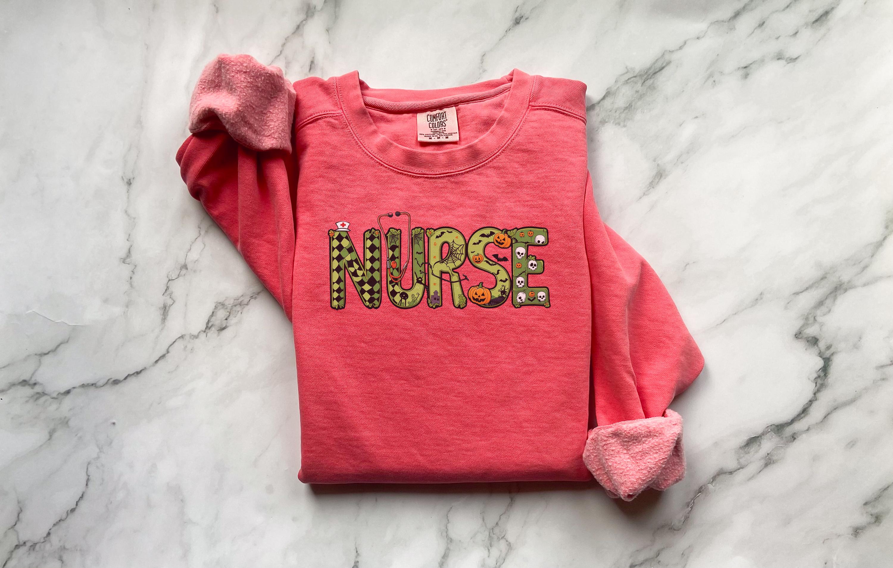 Retro Zombie Halloween Nurse Sweatshirt, Letters RN Shirt, Spooky Green Cute Nurse Jumper, Funny Nursing Halloween Gift for Nurse RN