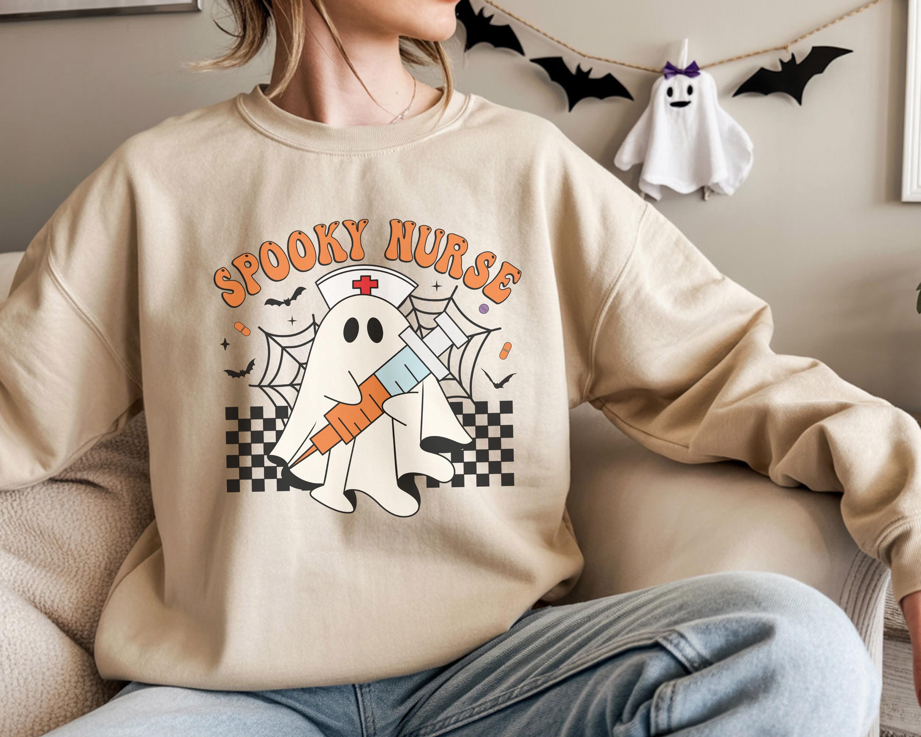 Spooky Nurse retro Halloween Sweatshirt, Halloween Gift for Nurse Sweater, Nurse Spooky , Nurse Halloween Boo Boo Crew