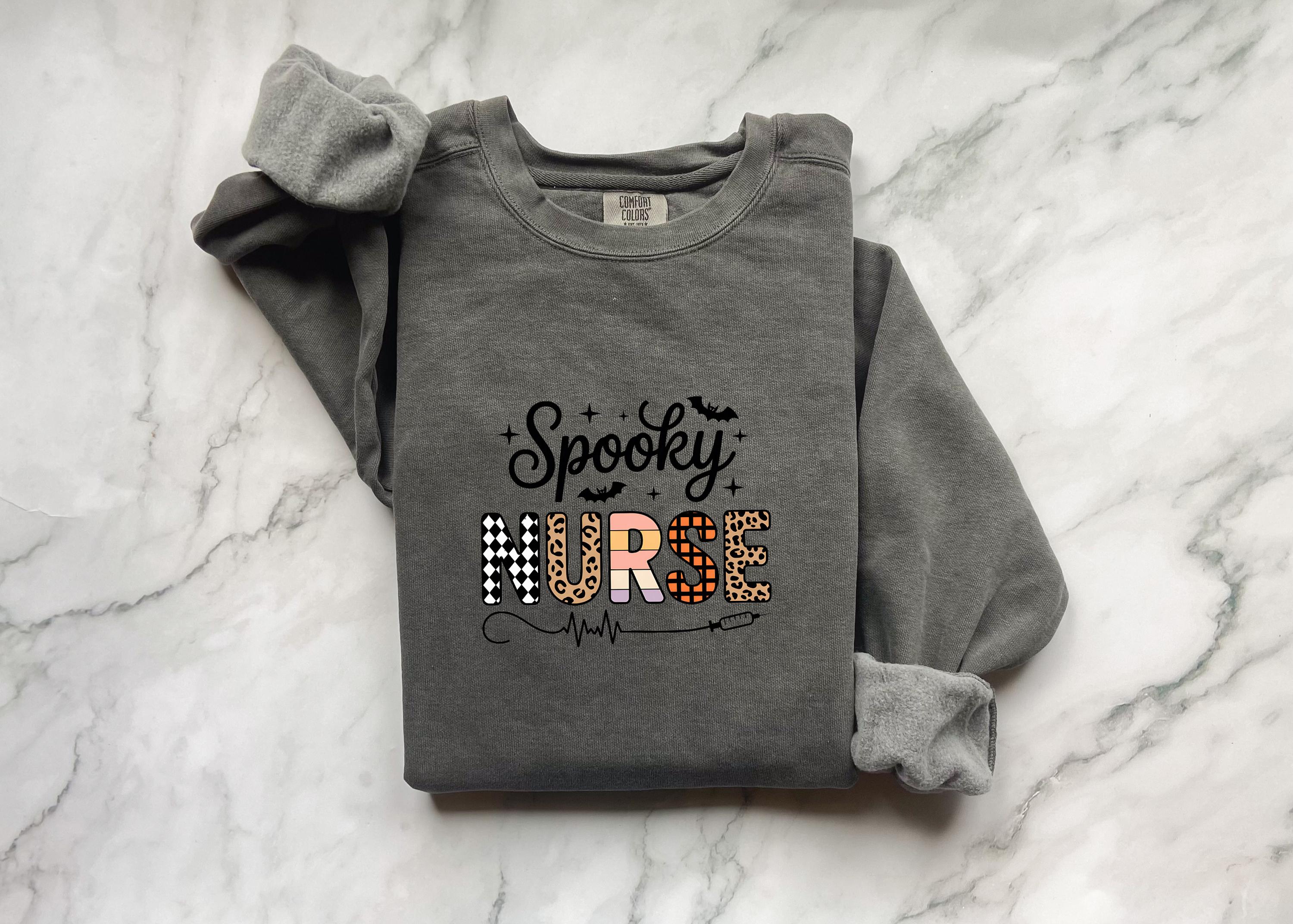 Spooky Nurse Halloween Sweatshirt, Spooky RN Fall Top Cozy Autumn Pullover, Cute Retro Gift for Nurse health worker