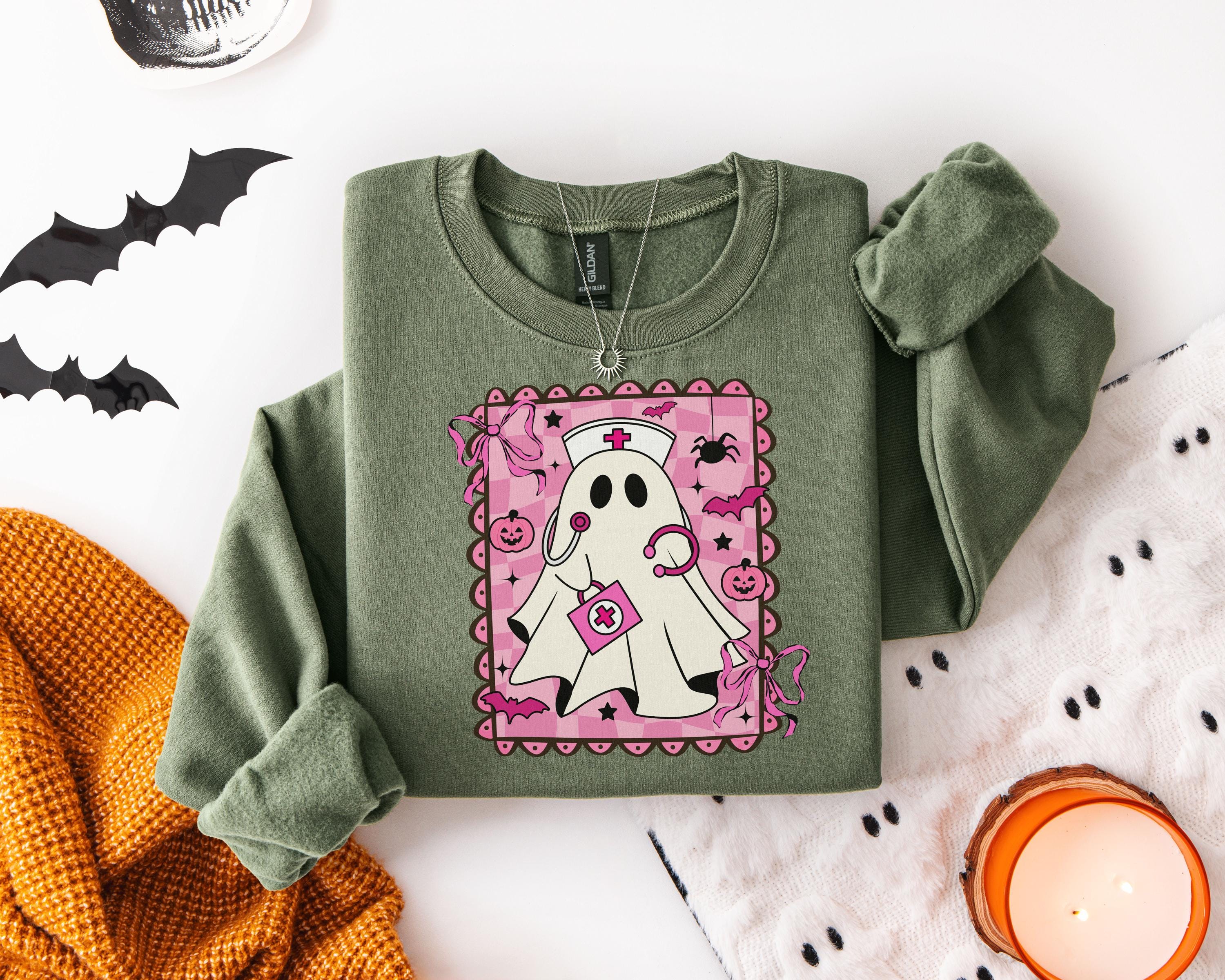 Pink ghost Halloween Nurse Shirt, Cute Pink Ghost RN Sweatshirt, Spooky Floral Nurse Outfit, Funny Halloween Nurse Gift for Nurse