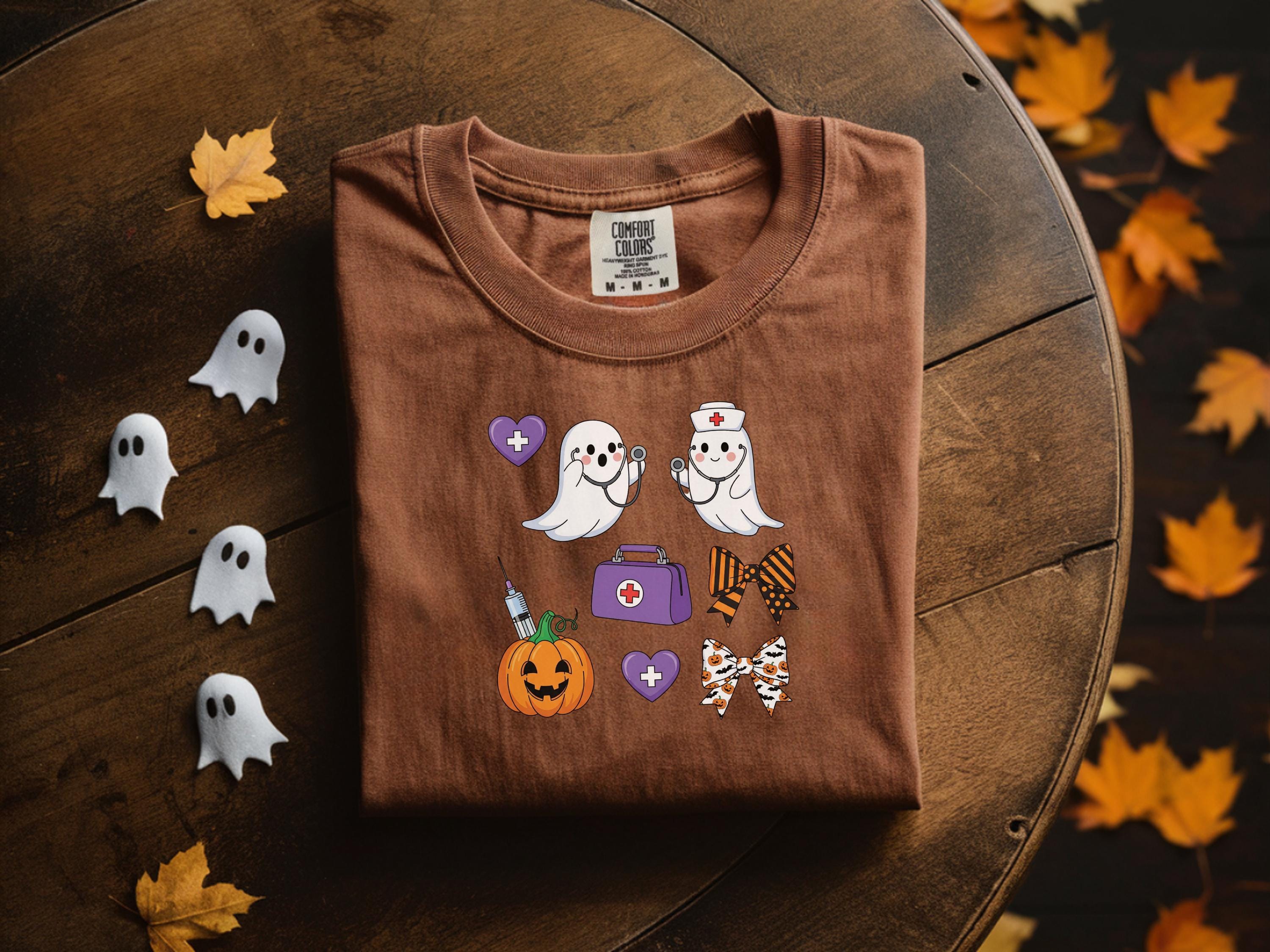 Halloween Nurse Shirt, Cute Ghost RN Tee with Pumpkin and Bows, Spooky Fall Medical Funny Trick or Treat Outfit, Gift for Nurse, ER Crew