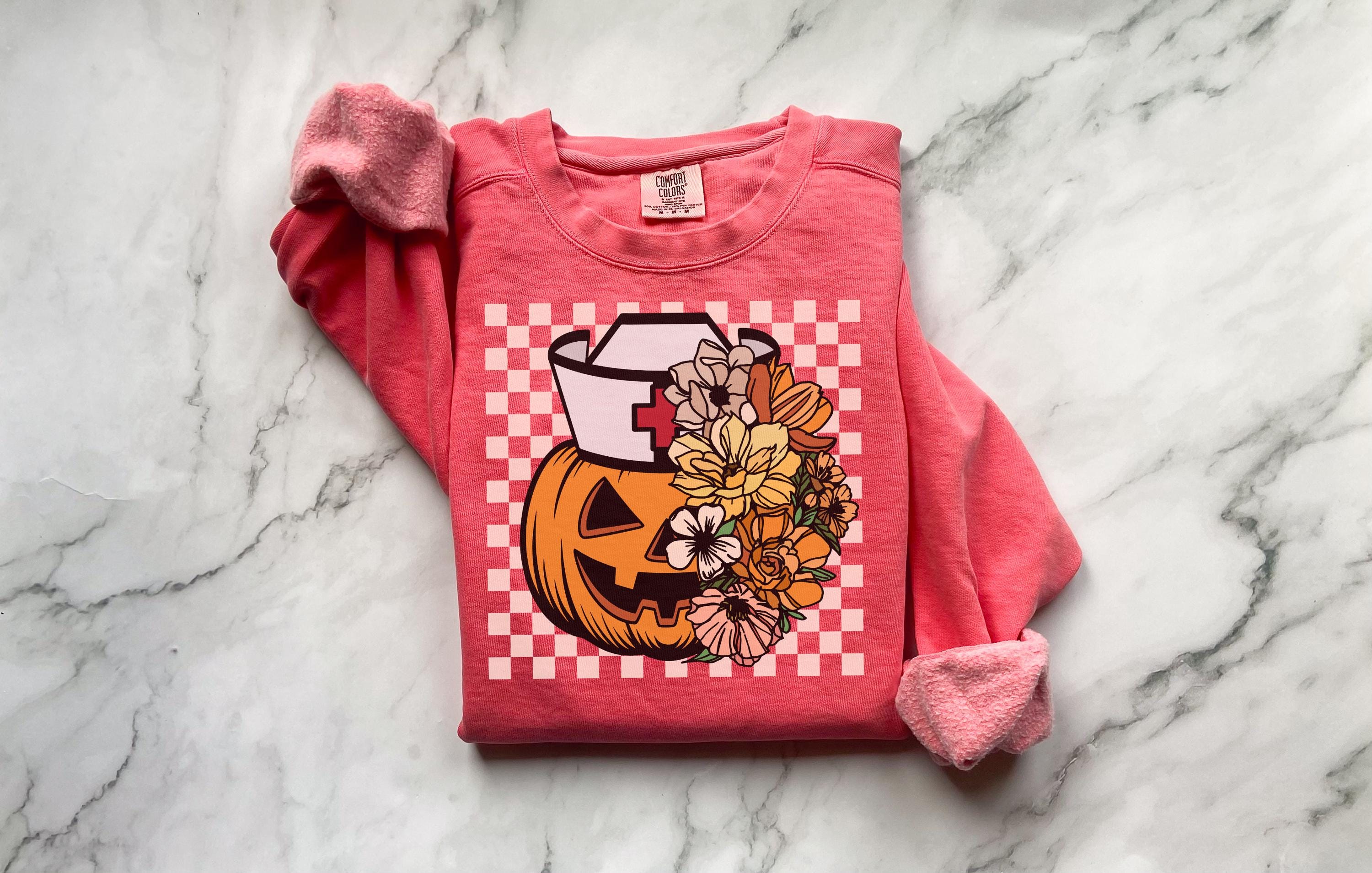 Halloween Nurse Shirt, Cute Pumpkin Ghost RN Tee, Spooky Fall Nurse Top, Funny Medical Halloween Outfit, Gift for Nurse, RN Apparel