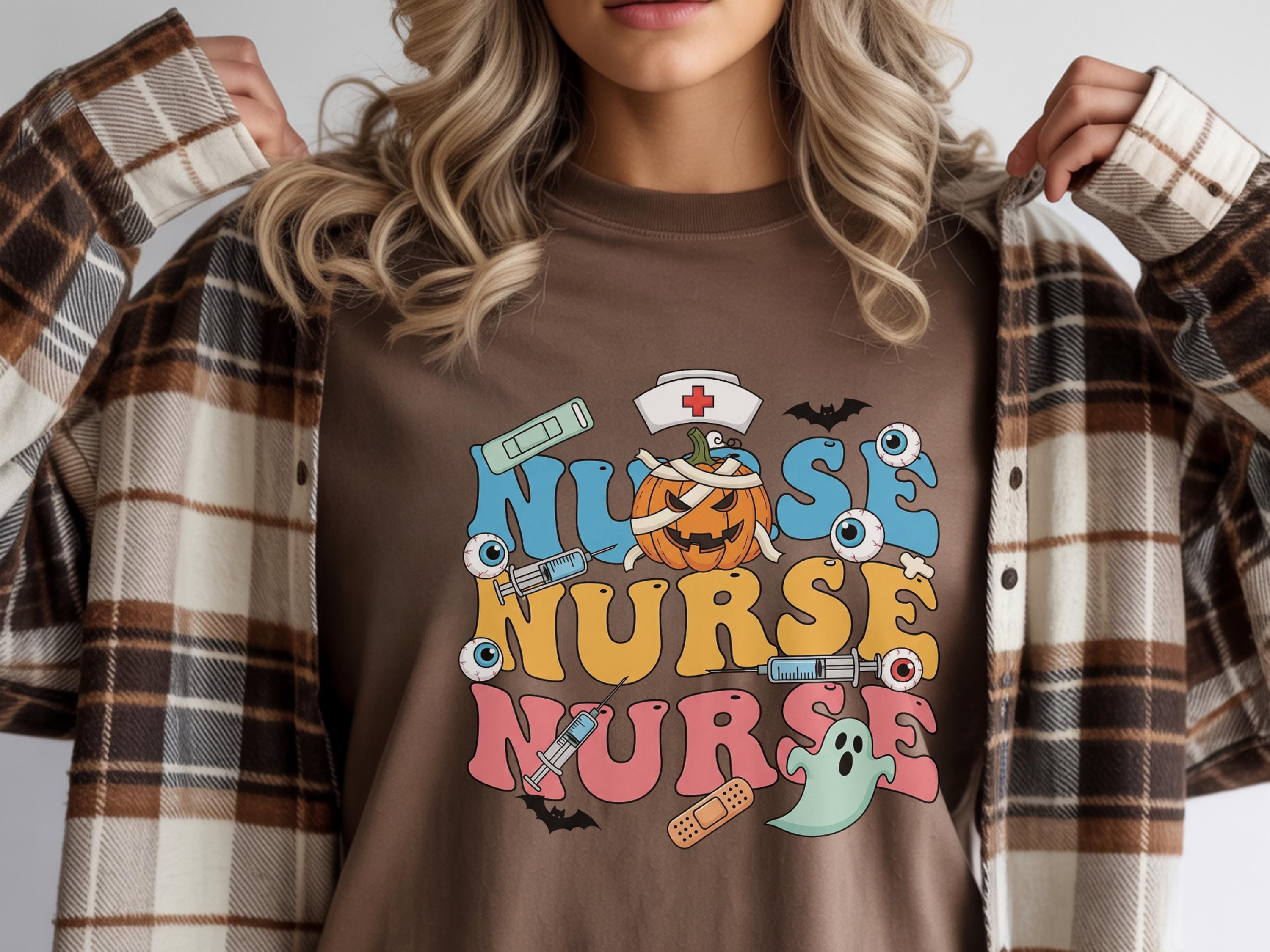 Vintage Nurse Halloween Colorful Sweatshirt, Cute Medical Fall Shirt with Ghosts, Pumpkin, and Eyeballs, Spooky Gift for Healthcare Nurse