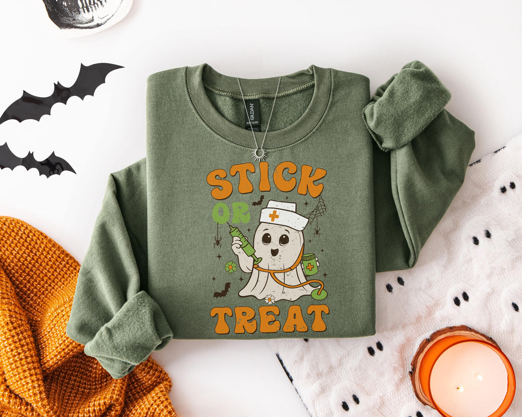 Stick or Treat Halloween Nurse Sweatshirt, Funny Ghost RN Top with Syringe, Spooky Medical Fall Apparel, Cozy Autumn Outfit, Gift for Nurse