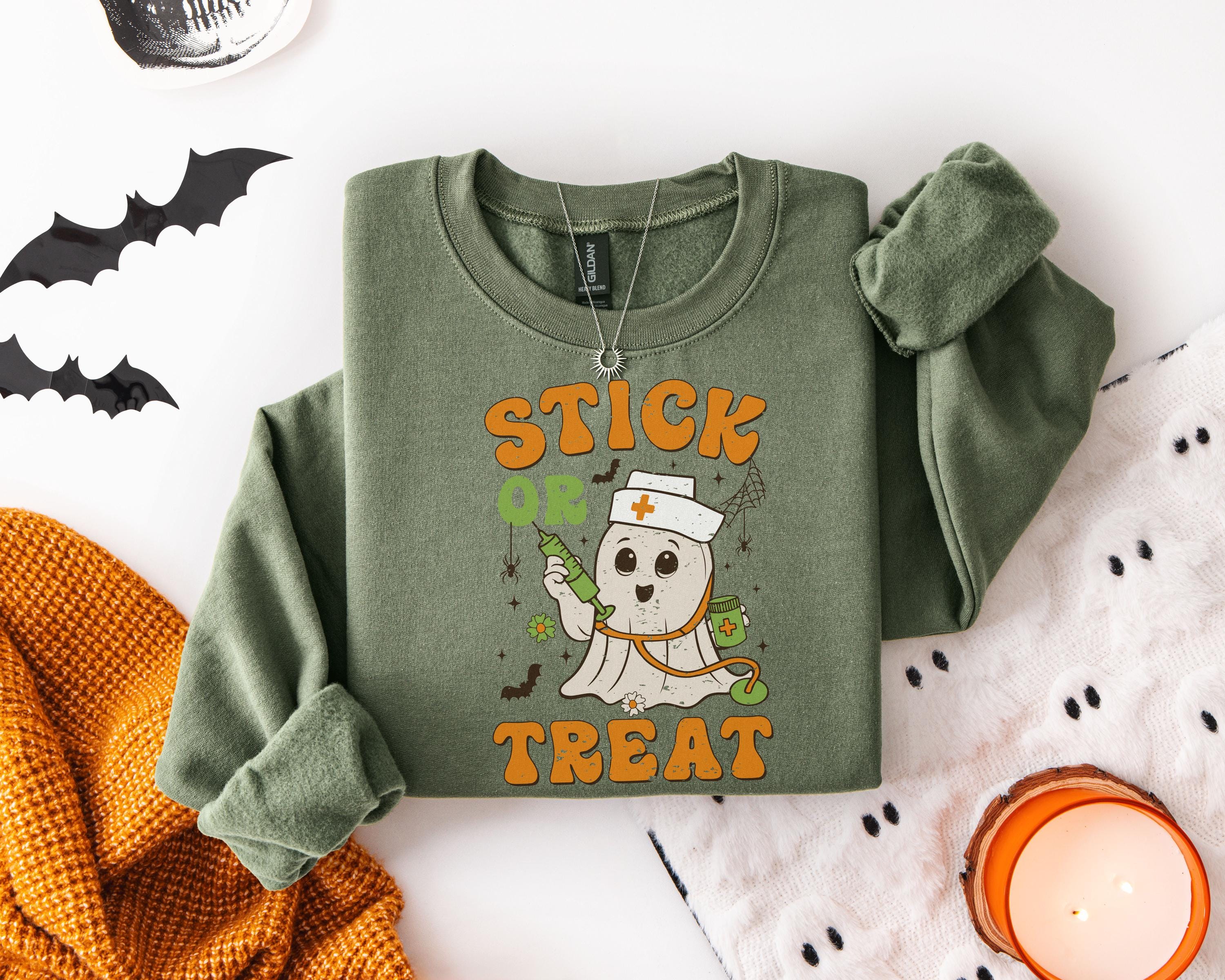 Stick or Treat Halloween Nurse Sweatshirt, Funny Ghost RN Top with Syringe, Spooky Medical Fall Apparel, Cozy Autumn Outfit, Gift for Nurse