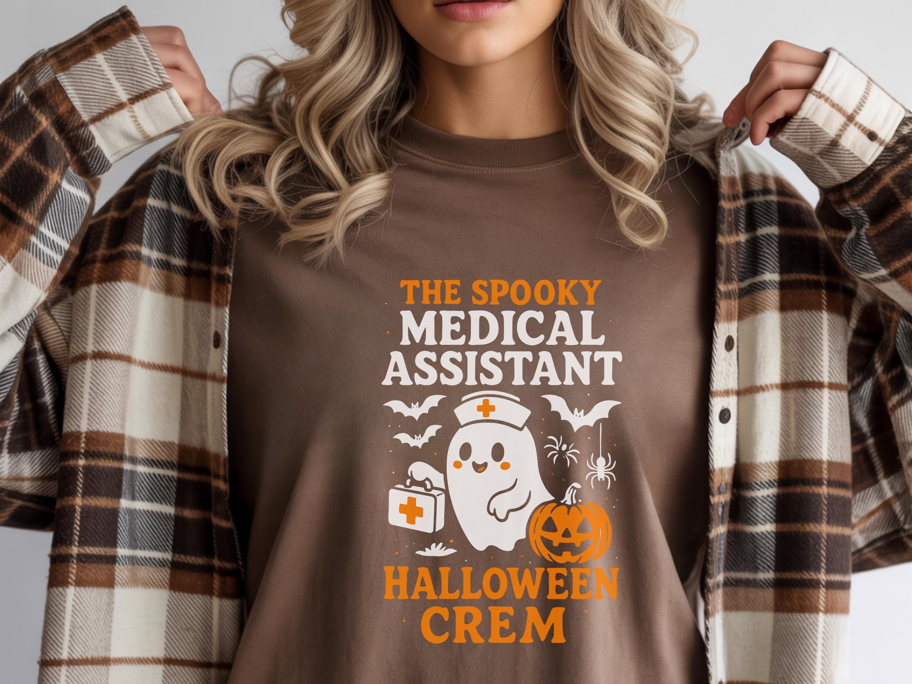 The Spooky Medical Assistant Halloween Crem shirt, Spooky Fall Pullover, Cozy Autumn Apparel, Gift for Nurse