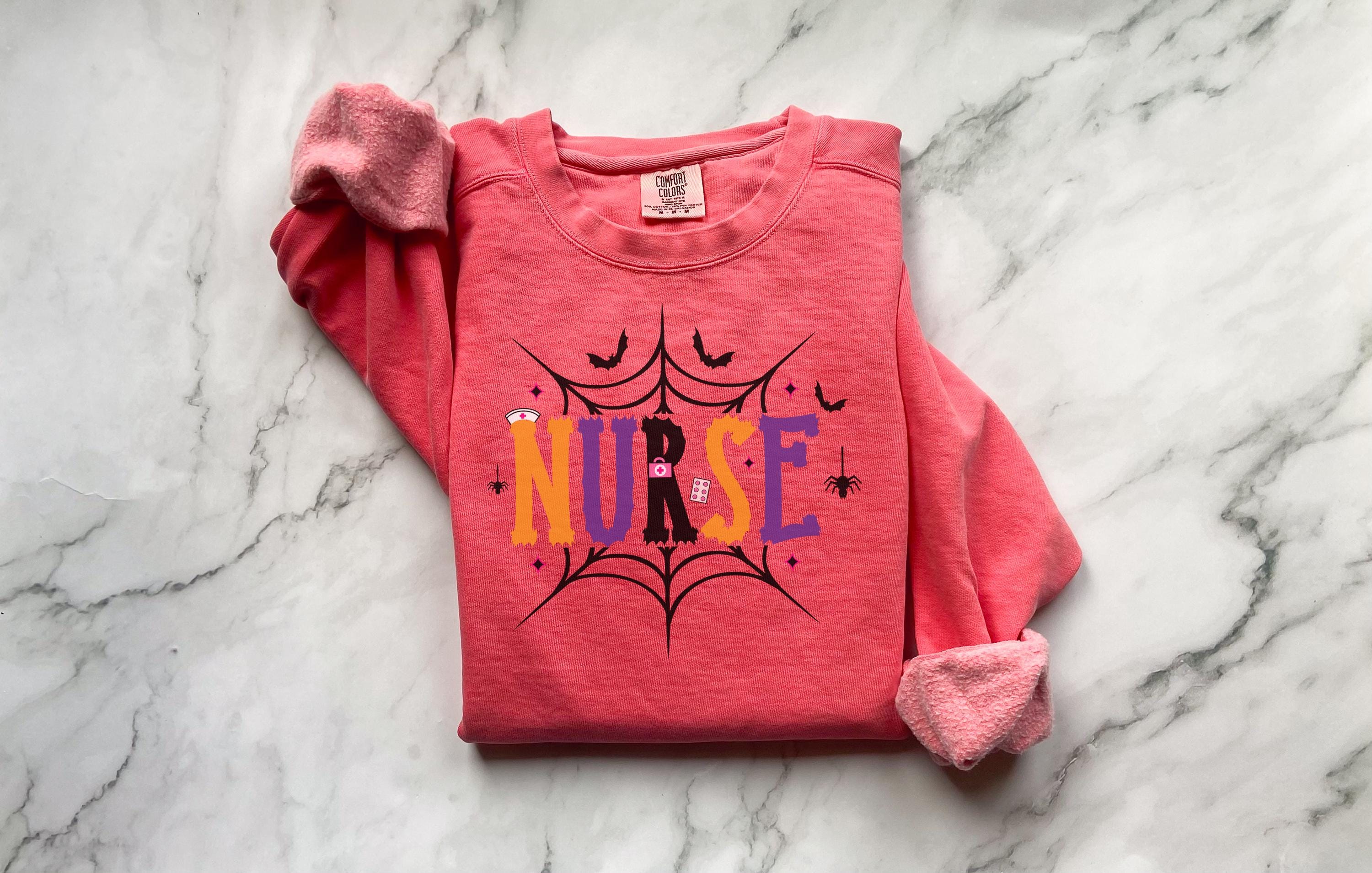 Spooky Season Nurse Sweatshirt: Halloween Spiderweb RN Top