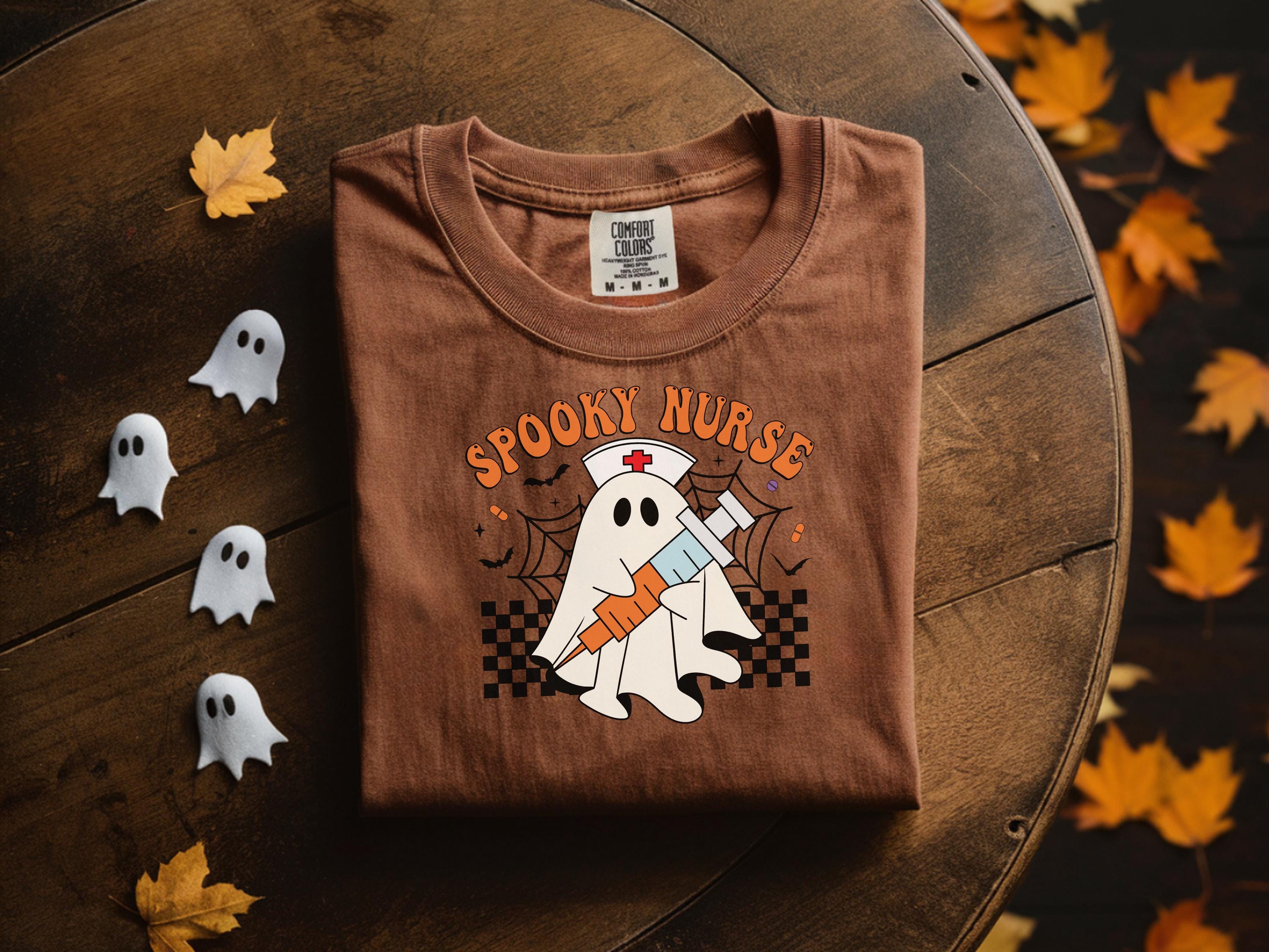 Spooky Nurse Halloween Sweatshirt, Cute Ghost RN Top with Syringe, Funny Medical Fall Apparel, Cozy Autumn Outfit, Unique Gift for Nurse