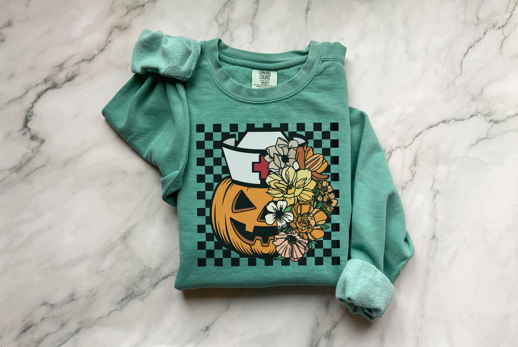 Floral Scary pumpkin, Halloween Nurse Sweatshirt, Spooky RN Fall Top, Funny Apparel, Cozy Autumn Pullover, Cute Retro Gift for Nurse