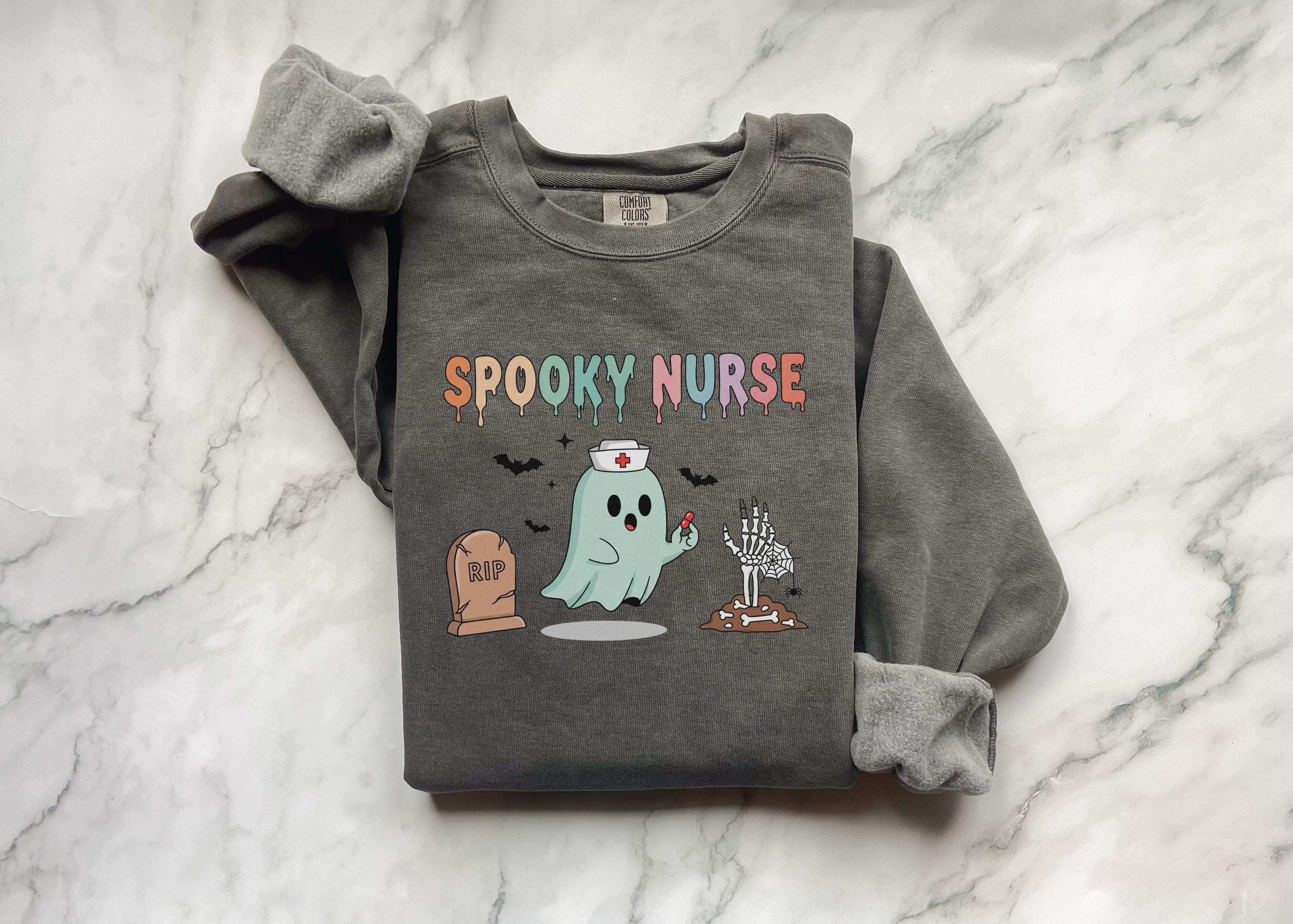 Cute Spooky Nurse Halloween Shirt, Funny RN Sweatshirt, Cute Fall Apparel, Cozy Autumn Outfit, Unique Gift for Nurse