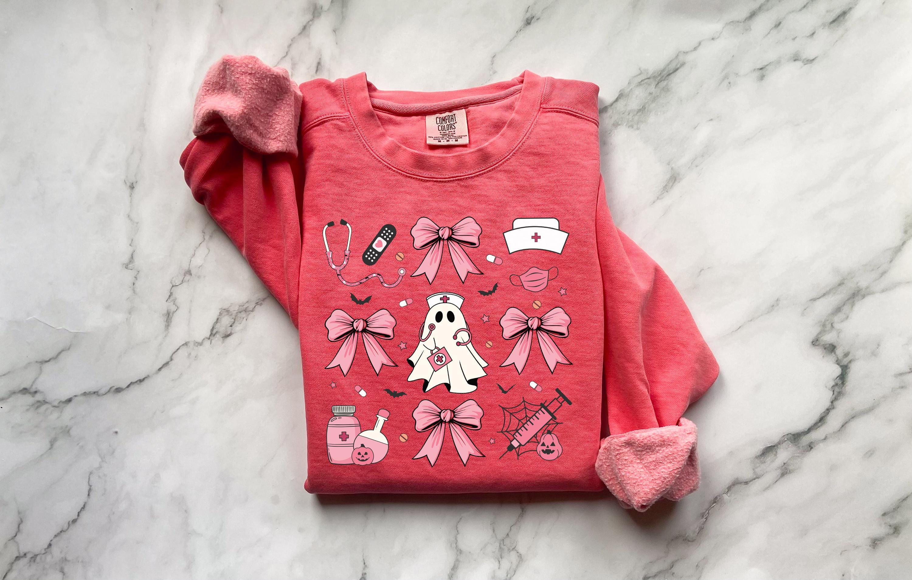 Cute nurse ghost Halloween Nurse Sweatshirt,  Pink Halloween Bow RN Fall Top Cozy Autumn Pullover, Cute Retro Gift for Nurse