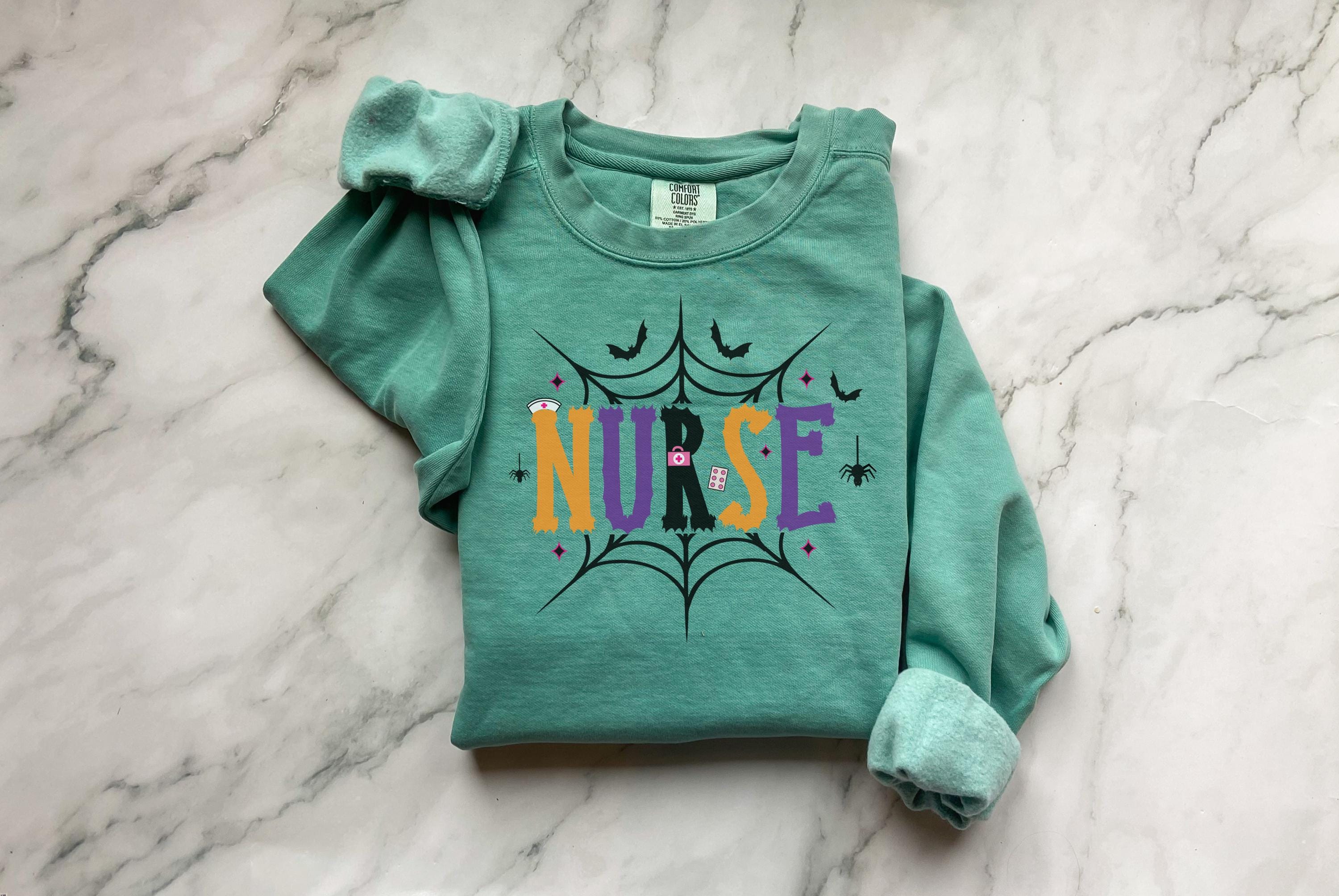 Halloween Nurse Sweatshirt, Spooky Season Shirt for Medical Workers, Cute Fall RN Gift Idea, Funny Nurse Halloween Top costume