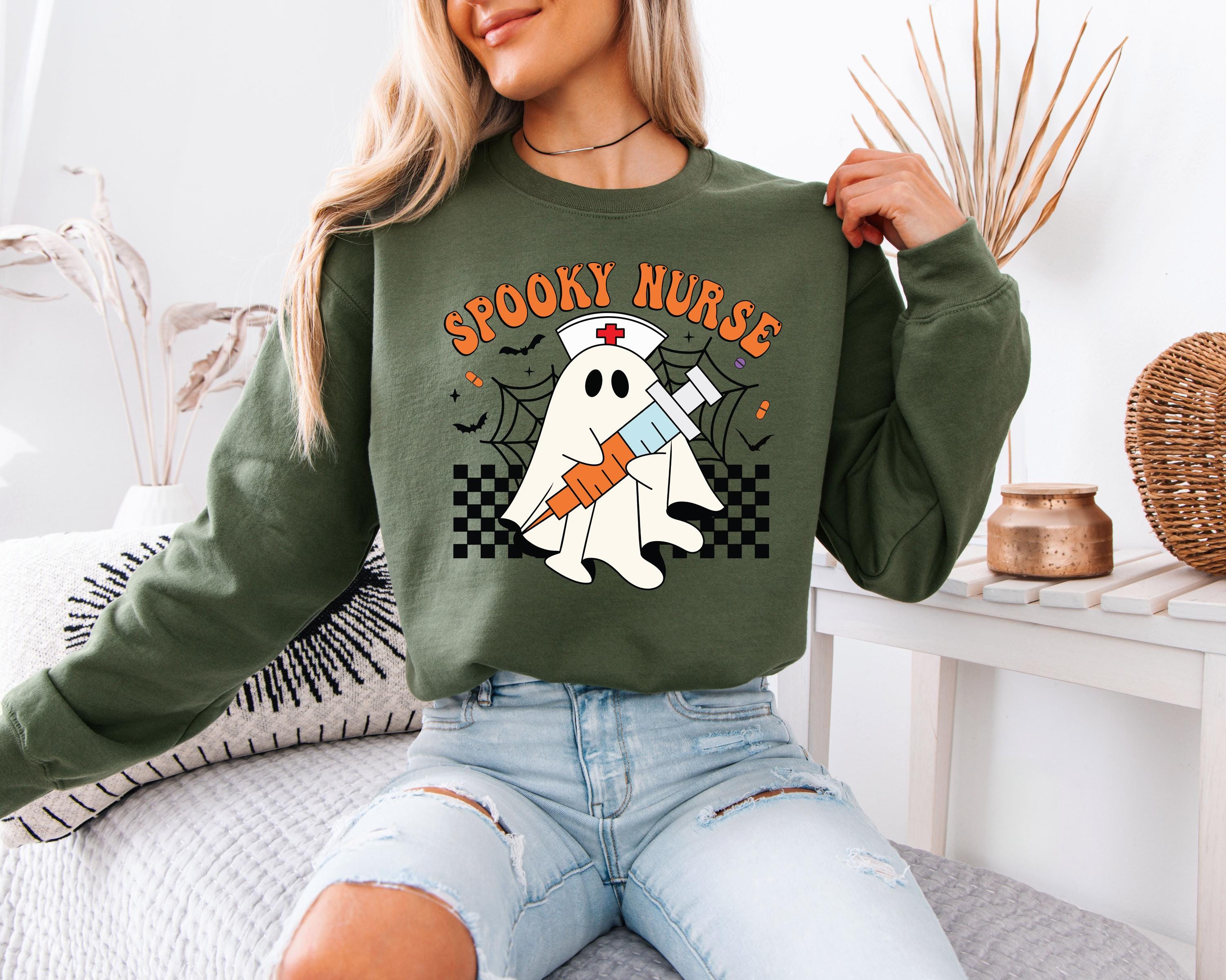 Spooky Nurse retro Halloween Sweatshirt, Halloween Gift for Nurse Sweater, Nurse Spooky , Nurse Halloween Boo Boo Crew