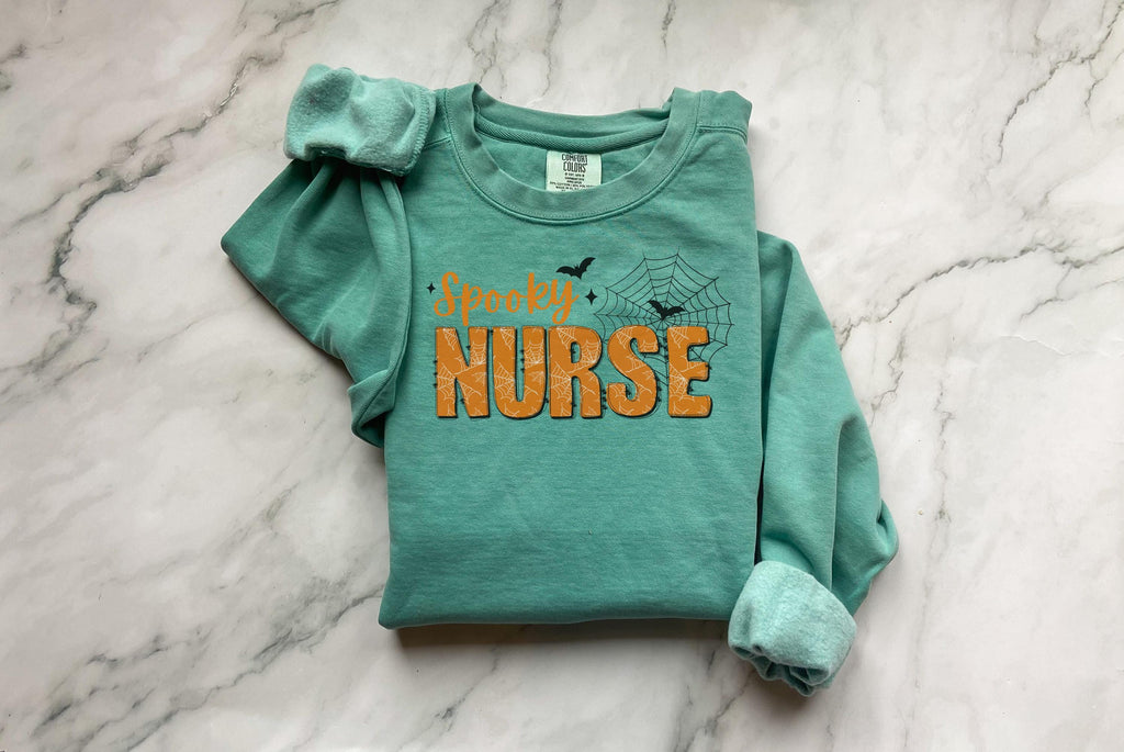 Spooky Nurse Halloween Sweatshirt, Minimalist RN Top with Bats, Cute Fall Medical Apparel, Funny Cozy Autumn Outfit, Unique Gift for Nurse