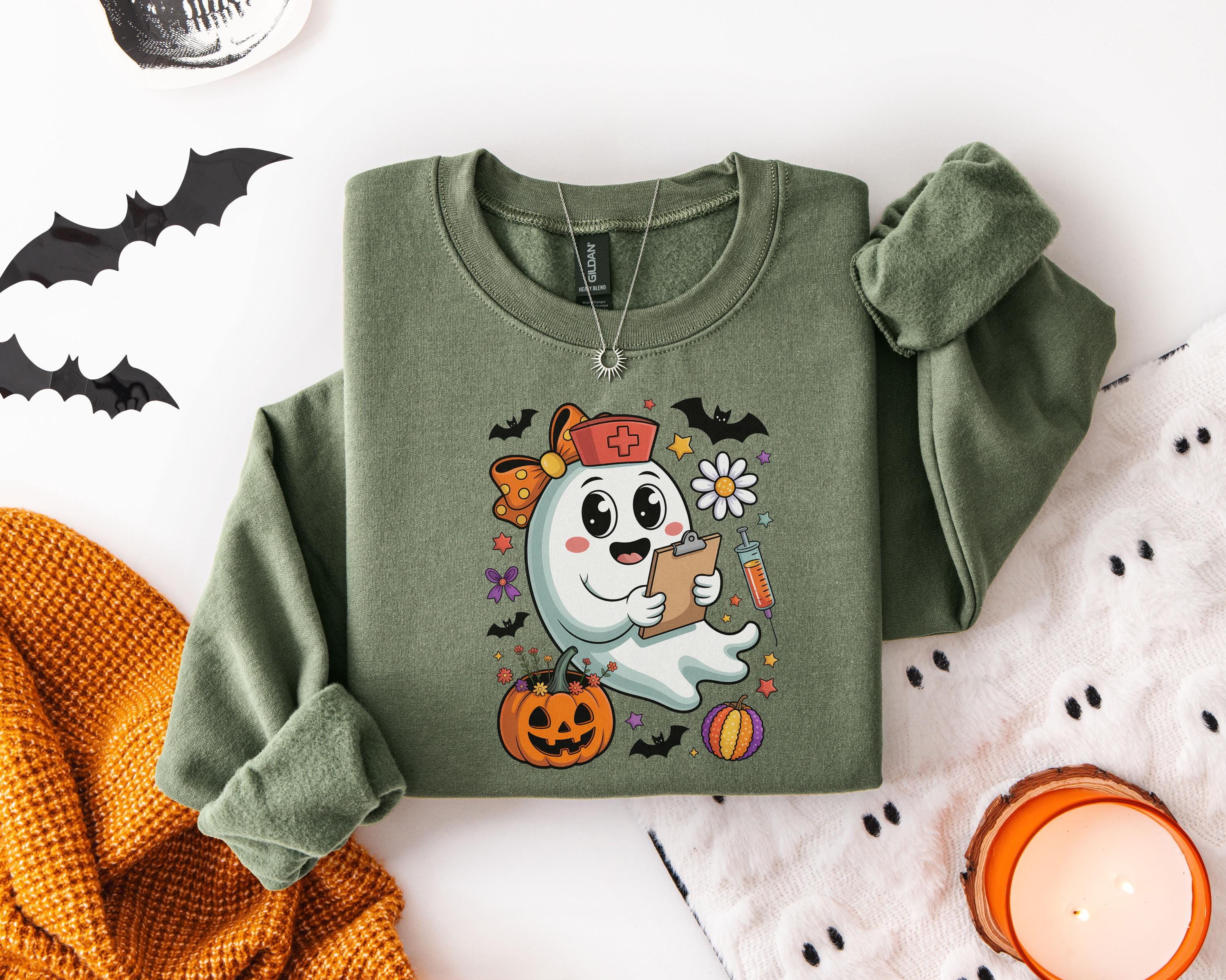 Cute Ghost Nurse Halloween Sweatshirt, Spooky Medical Fall Shirt with Pumpkins and Bats, Funny Gift for Nurse or Healthcare Worker