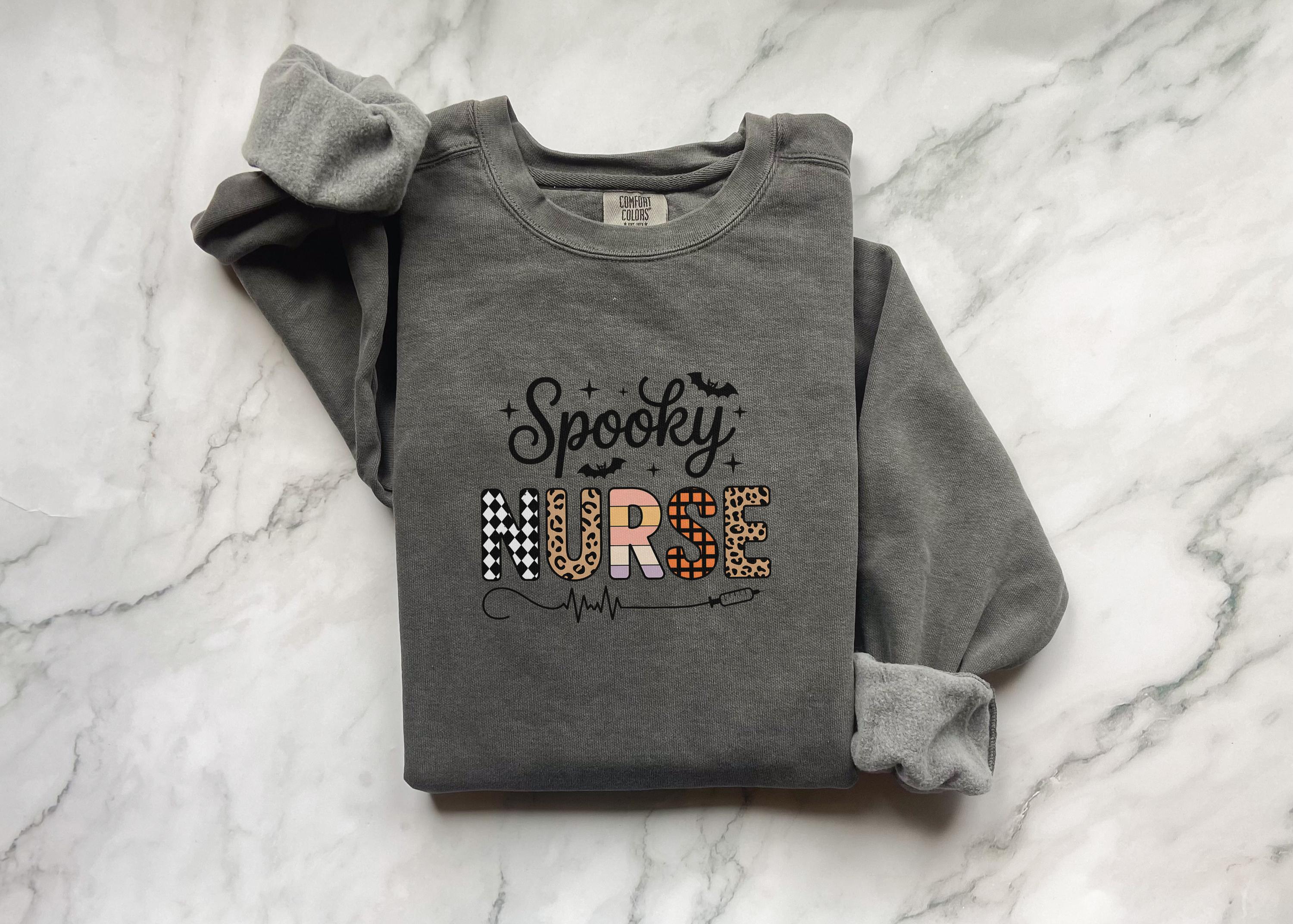 Spooky Nurse Halloween Sweatshirt, Cute RN Top with Bats and Syringe, Funny Medical Fall Apparel, Cozy Autumn Outfit, Gift for Nurse