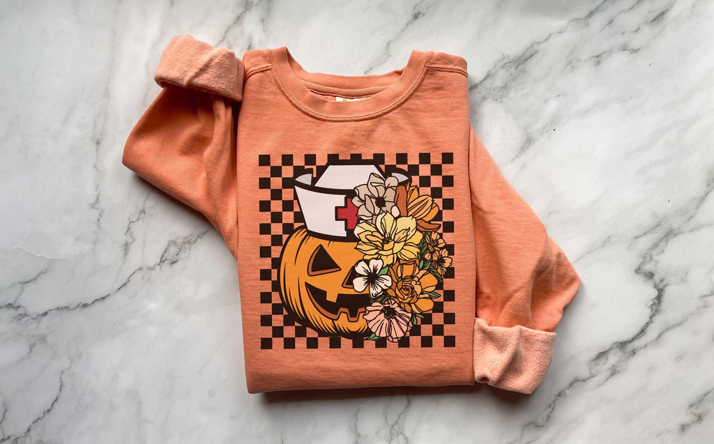 Floral Scary pumpkin, Halloween Nurse Sweatshirt, Spooky RN Fall Top, Funny Apparel, Cozy Autumn Pullover, Cute Retro Gift for Nurse