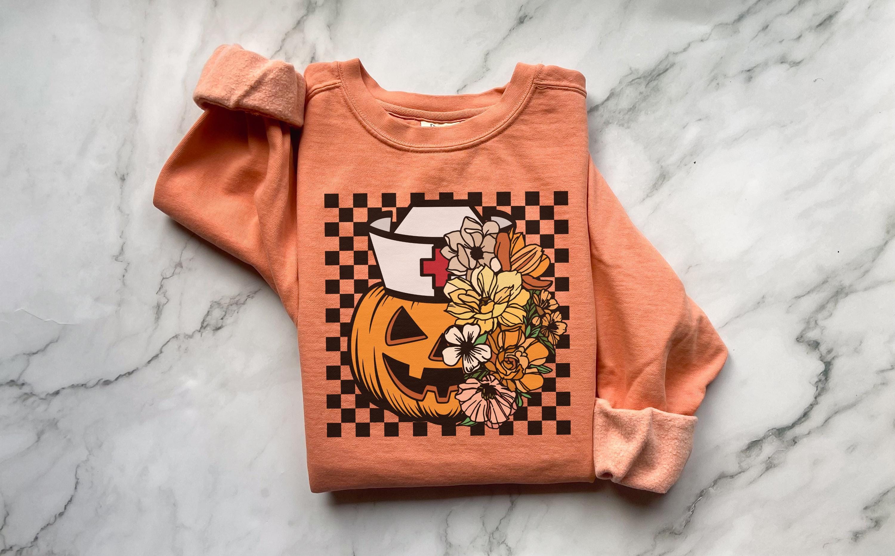 Floral Scary pumpkin, Halloween Nurse Sweatshirt, Spooky RN Fall Top, Funny Apparel, Cozy Autumn Pullover, Cute Retro Gift for Nurse