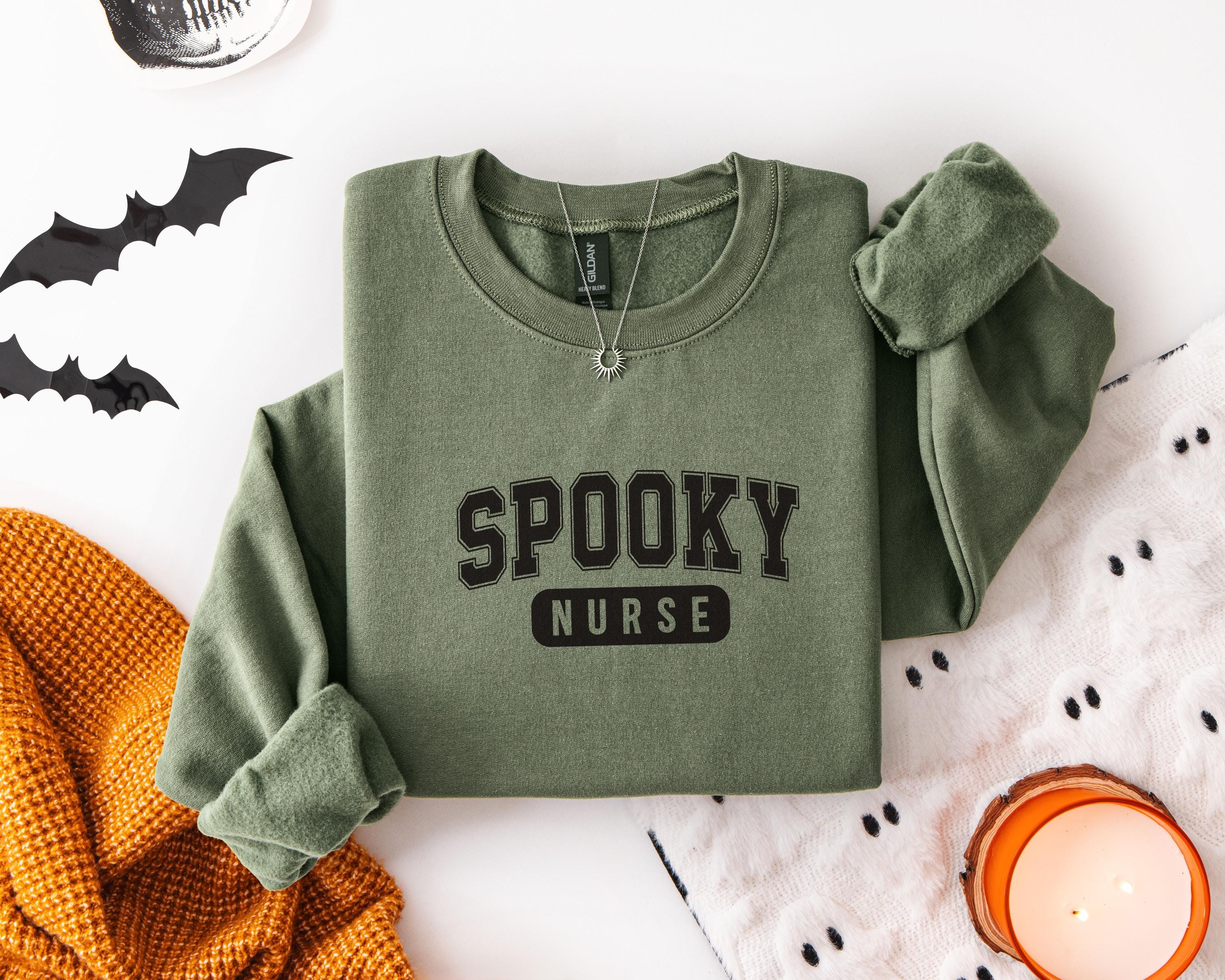 Spooky Nurse Halloween Sweatshirt, Funny RN Top in Retro College Font, Cute Medical Fall Apparel, Cozy Autumn Outfit, Unique Gift for Nurse