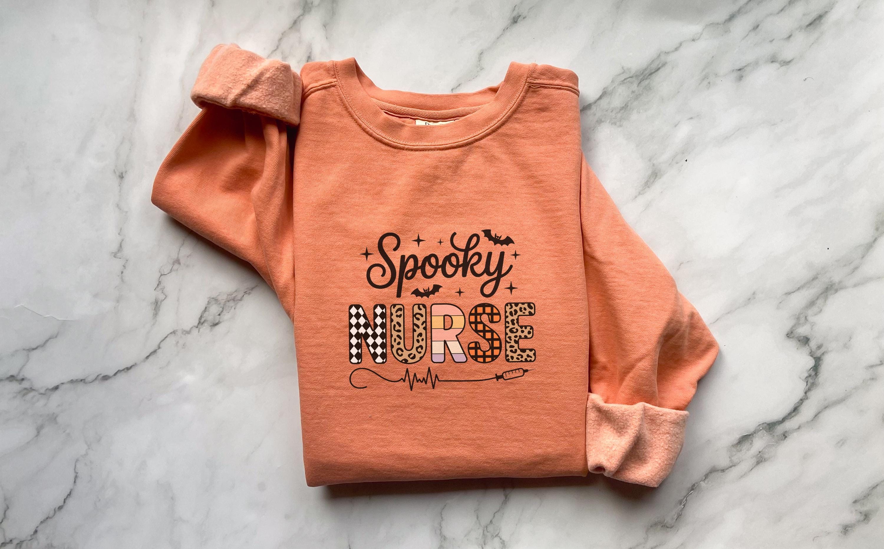 Spooky Nurse Halloween Sweatshirt, Spooky RN Fall Top Cozy Autumn Pullover, Cute Retro Gift for Nurse health worker