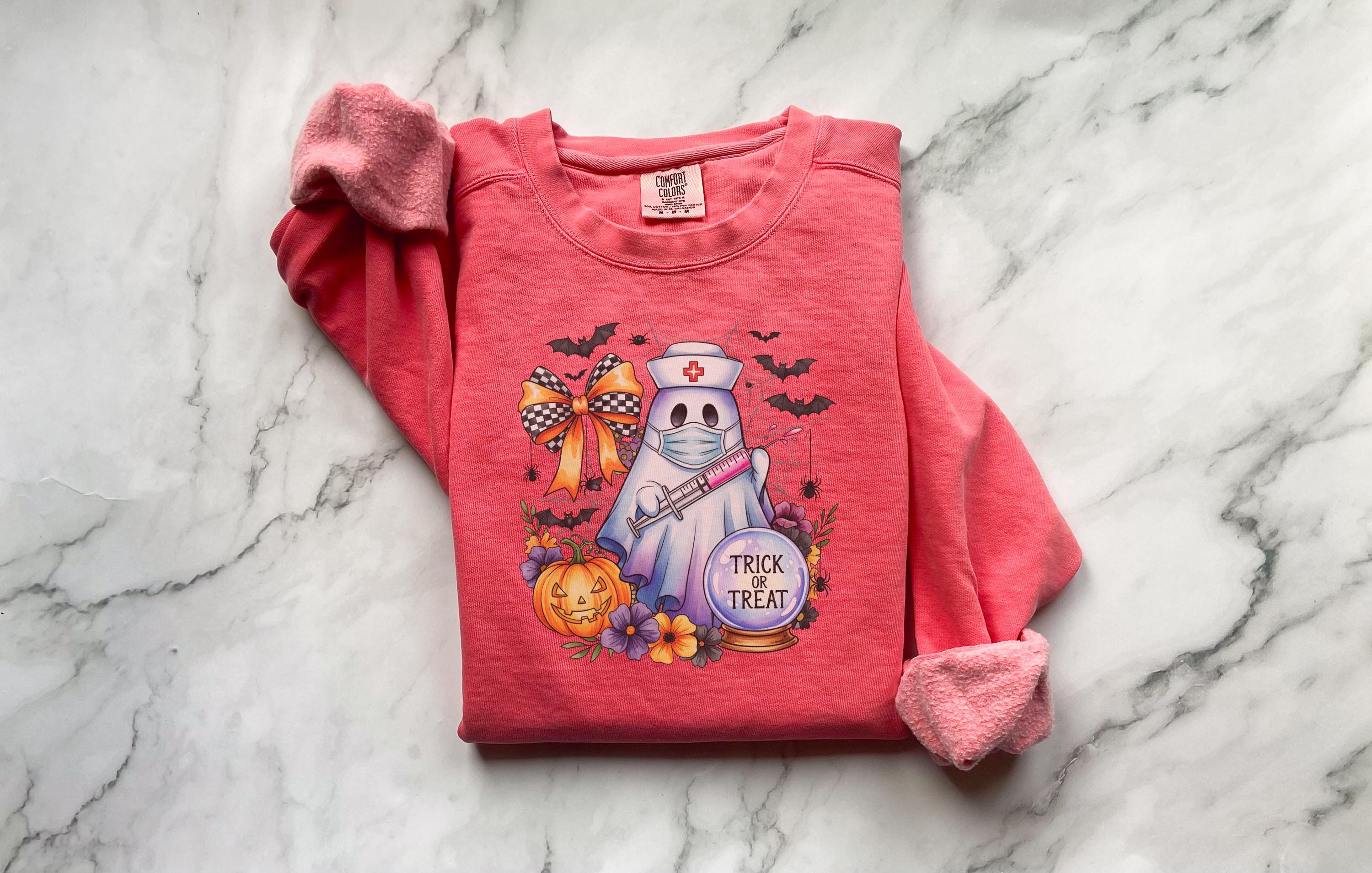 Trick or Treat Halloween Nurse Sweatshirt, Spooky Ghost RN shirt with Pumpkin,  Medical Outfit, Cute Fall Apparel, Gift for Nurse