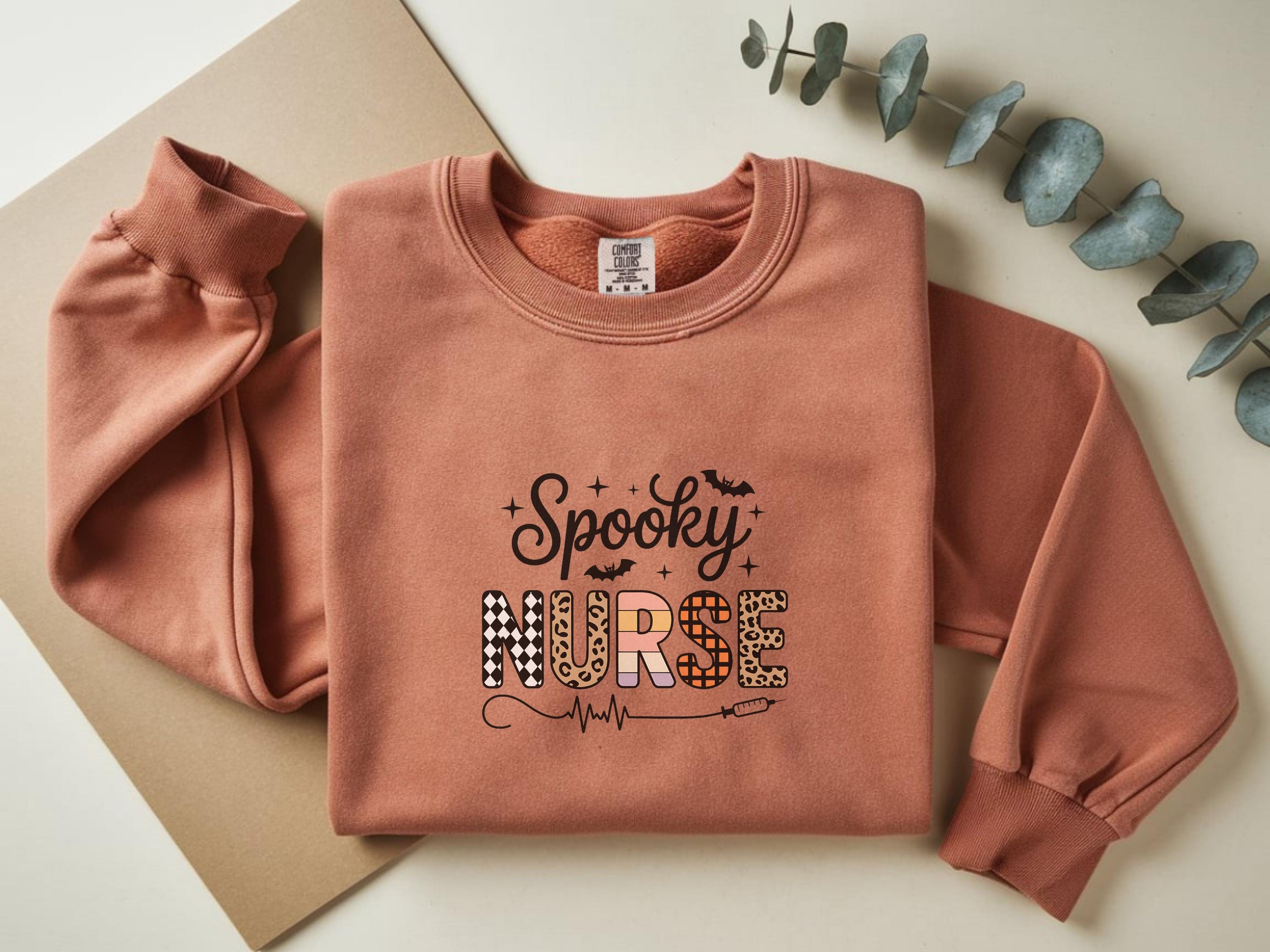 Spooky Nurse Halloween Sweatshirt, Spooky RN Fall Top Cozy Autumn Pullover, Cute Retro Gift for Nurse health worker