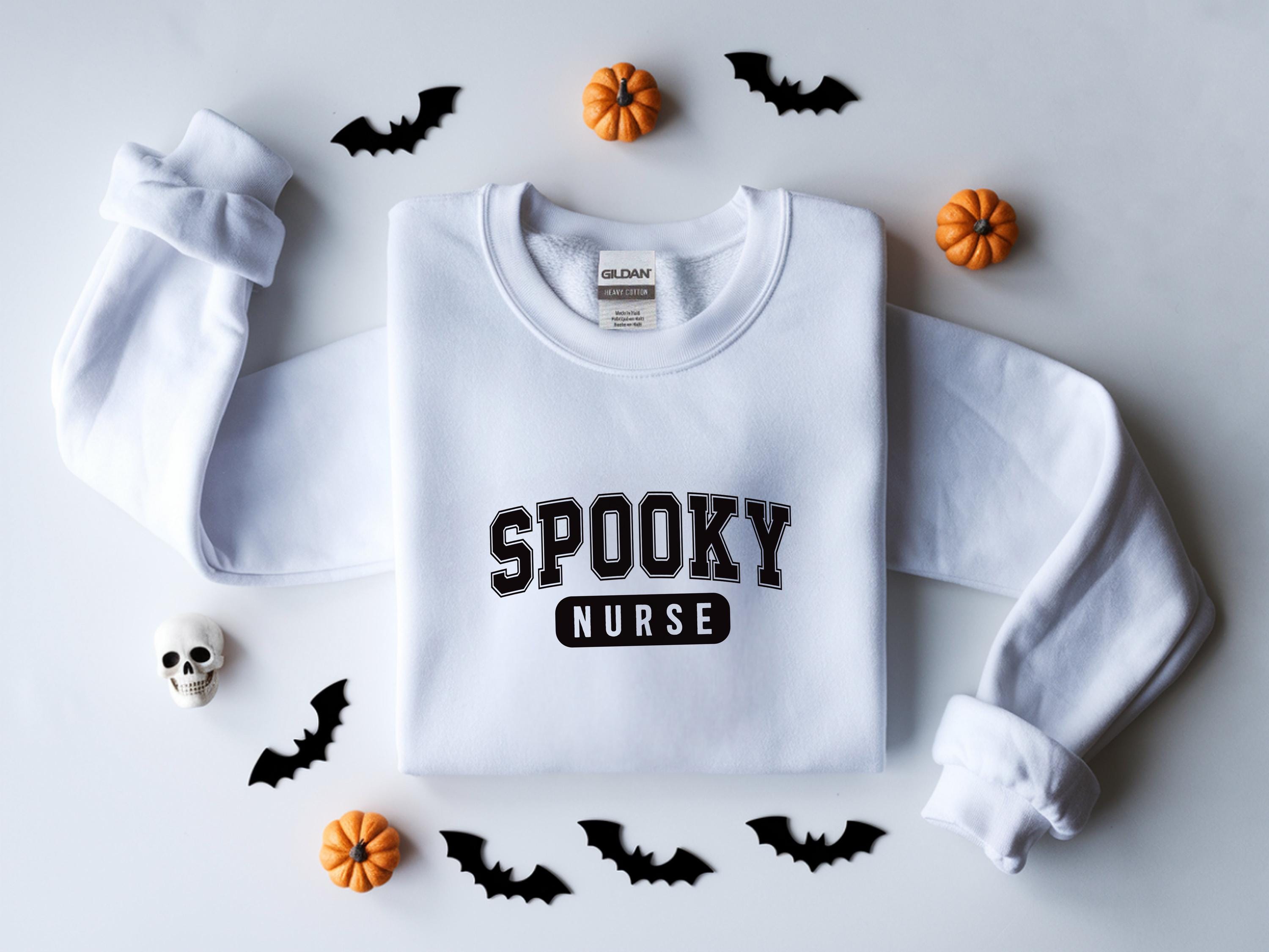 Spooky Nurse Halloween Sweatshirt, Halloween Gift for Nurse Sweater, Nurse Spooky , Nurse Halloween Boo Boo Crew